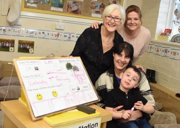 Coun Joan Atkinson, left, and Clervaux head teacher Jenny Parker with Jane Gray and son Jack.