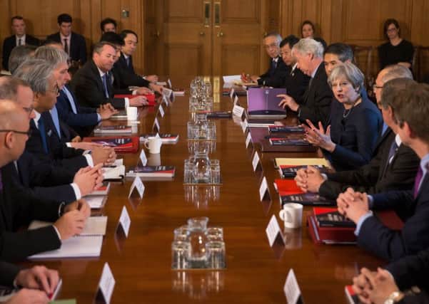 Prime Minister Theresa May speaks as she hosts a roundtable with Japanese investors in the UK at 10 Downing Street