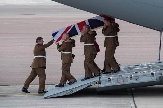 Capt Sprouting's coffin is carried from the Hercules