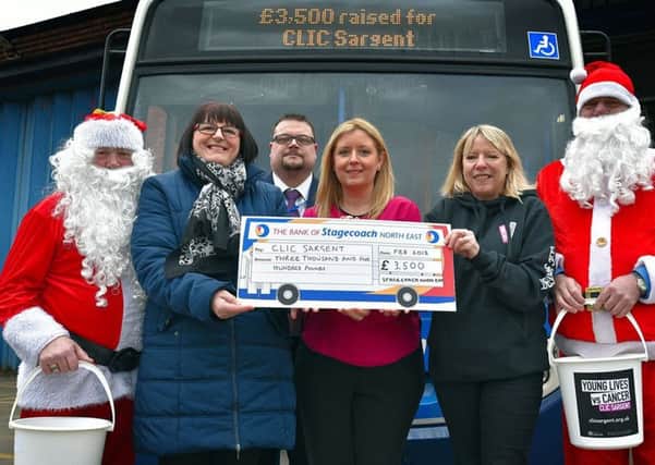From left, Stagecoach driver Kenny Ramsey, Susan Clarkson of CLIC Sargent, Stagecoaches Mark McCann and Janine Fowley, Lindsay Kay of CLIC Sargent and George Miller of Stagecoach
