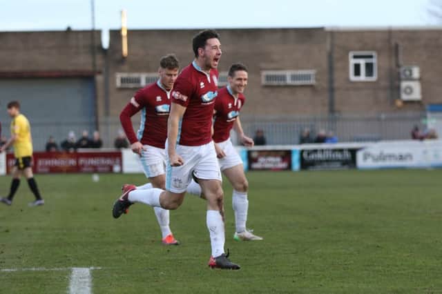 Robert Briggs celebrates against Skelmersdale United.