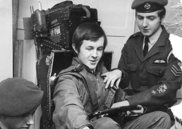 Pictured in the ejector seat during an open night in March 1970 is Warrant Officer Leslie Gustafson.