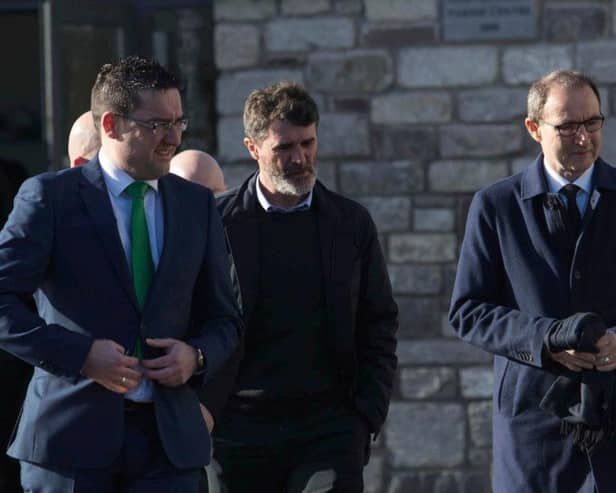 Roy Keane (centre) and Martin O'Neill (right) arrive for the funeral of former Celtic and Manchester United footballer Liam Miller, at St. John the Baptist Church in Ovens, County Cork. Picture by Clare Keogh/PA Wire