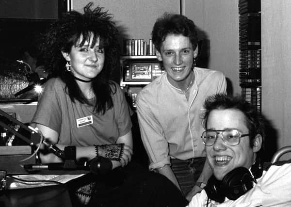 In the radio studio in January 1985 are, from left, Noreen Coltman, Ian Duncan and an unknown DJ.