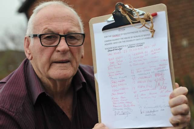 Hebburn resident John Welsh with his Disabled Bay parking petition.