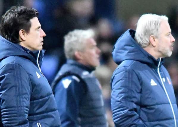 Chris Coleman and assistant Kit Symons watch Sunderland slip to defeat at Bolton. Picture by Frank Reid