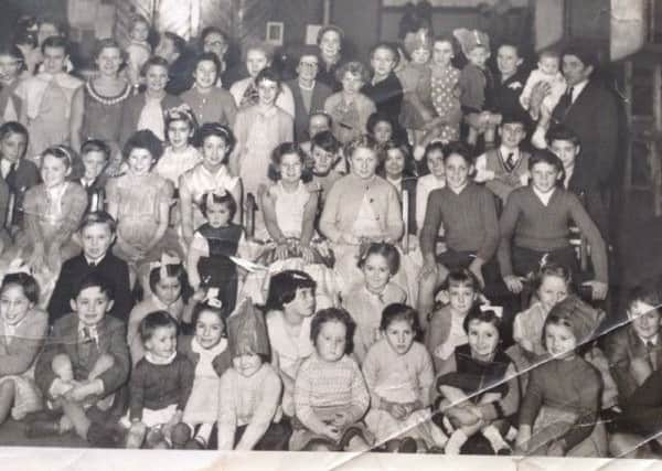 Maureen and her dad Ronnie (top right) at a Gazette Christmas party.