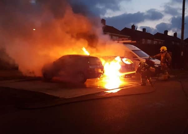 Two cars and a van were destroyed in a suspected arson attack in Peel Gardens, Simonside, South Shields, early today. Pic: Lisa Handy.