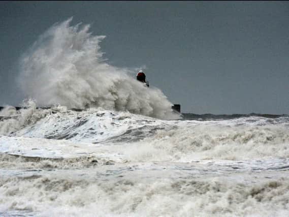 Waves battering South Shields coast.