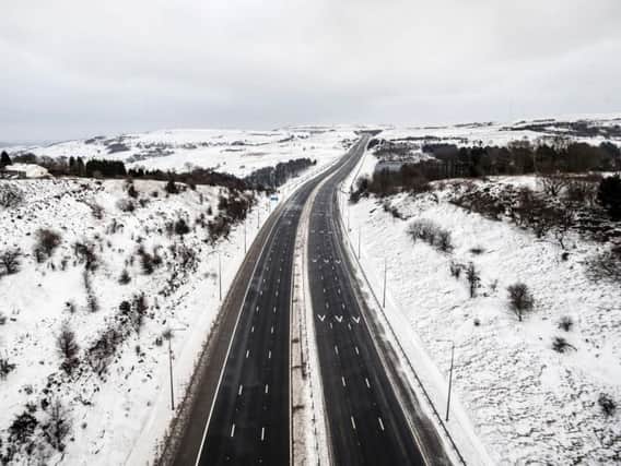 The M62 is the highest motorway in England and a large stretch of it remained closed due to the weather. Pic: PA.