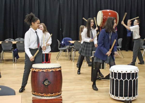 Drumming lessons at South Shields School.