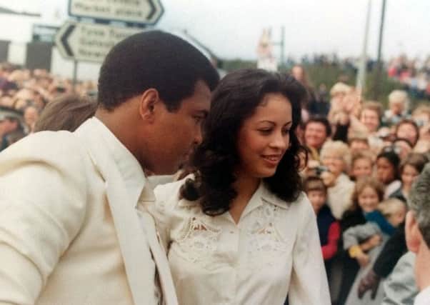 Muhammad Ali and his wife at the blessing ceremony.