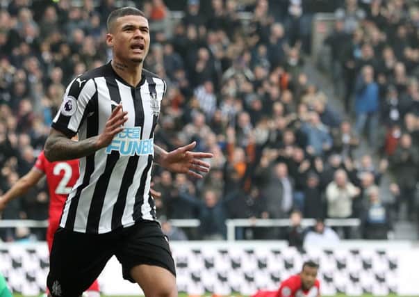 Kenedy celebrates scoring his second goal of the game