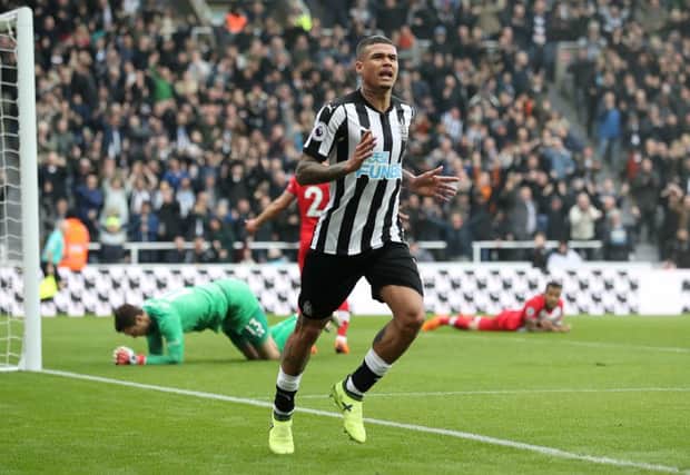 Kenedy celebrates scoring for Newcastle against Southampton.