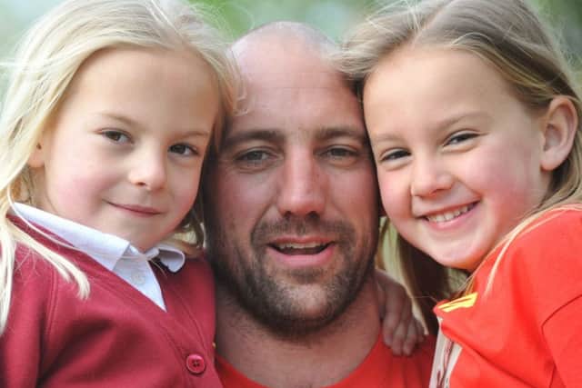 Gavin Calvert with twin daughters Scarlett and Jasmine
