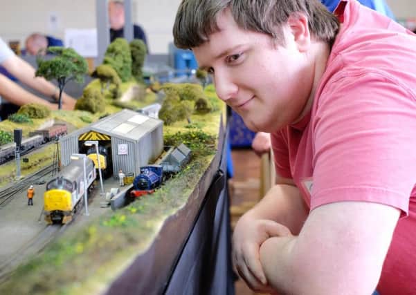 Model railway enthusiasts at a former exhibition