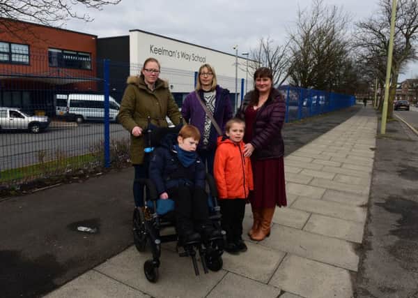From left, Karen Abraham and son Michael, Alison Hogg an Angela Robb and son  Ethan at Keelman's Way School