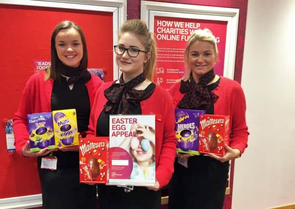 Virgin Money Store staff with some of the donated Easter Eggs.