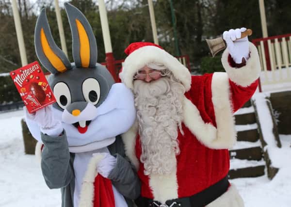 Darren Johnson who dresses as Santa is heading out in his Santa gear for some winter fun with the Easter Bunny. Picture: TOM BANKS