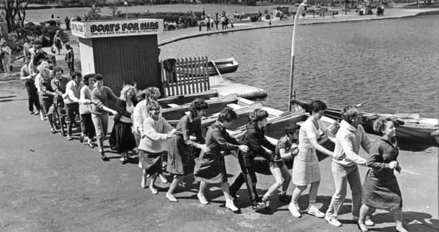 Woolworths staff conga their way round the South Marine Park lake for Sport Relief in 1986.