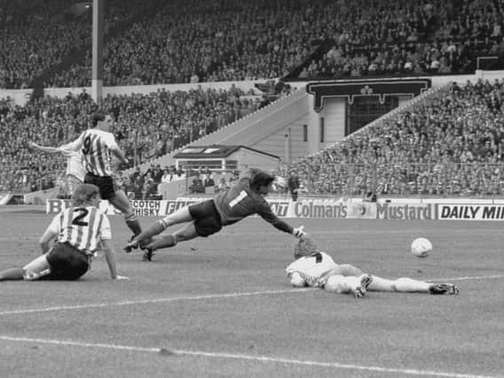 Sunderland goalkeeper Chris Turner comes under pressure during the 1985 final.
