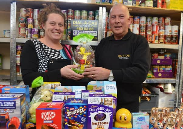 Dial A Cab Express taxis Jeff Fenwick easter egg donations to Hebburn Helps Angie Comerford