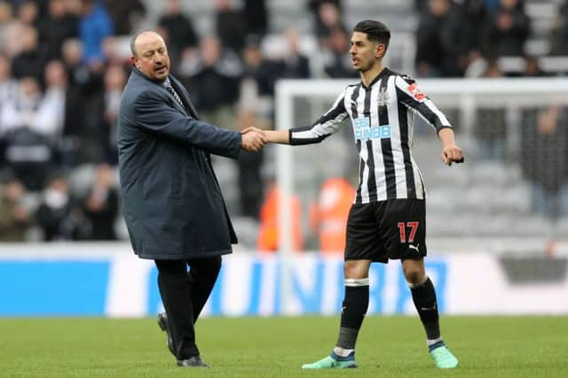Newcastle United manager Rafael Benitez shakes hands with goalscorer Ayoze Perez after the final whistle.