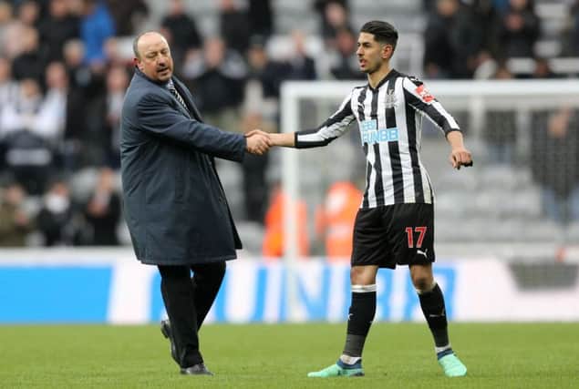 Newcastle United manager Rafael Benitez shakes hands with goalscorer Ayoze Perez after the final whistle.