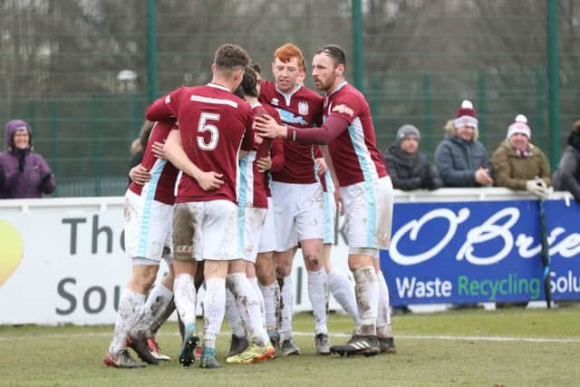 Shields celebrate Robert Briggs' goal.