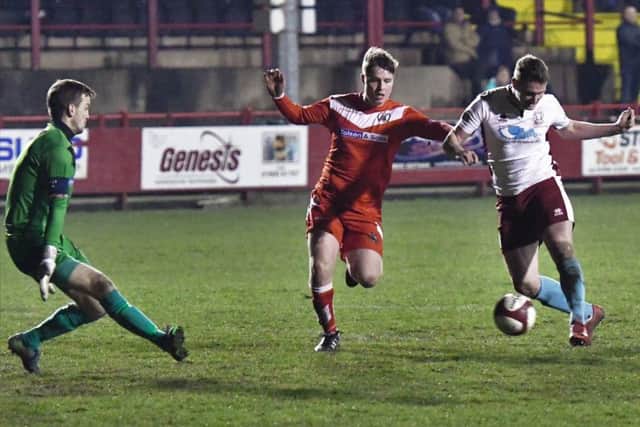 Graeme Armstrong hits Shields' fourth goal at Workington. Picture by Kevin Wilson