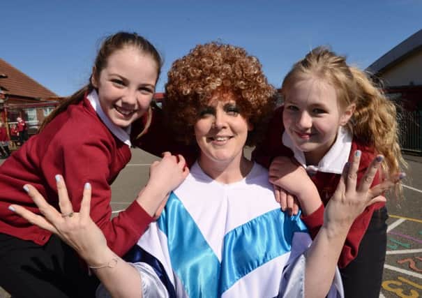 Teaching assistant Lisa Dobson with pupils (left) Grace Arthur and Ruby Reay during the 90th Birthday Celebrations at Valley View Primary School. Picture by Frank Reid