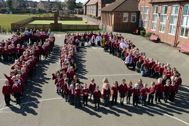 Staff and pupils create the number 90 during the 90th Birthday Celebrations at Valley View Primary School. Picture by Frank Reid