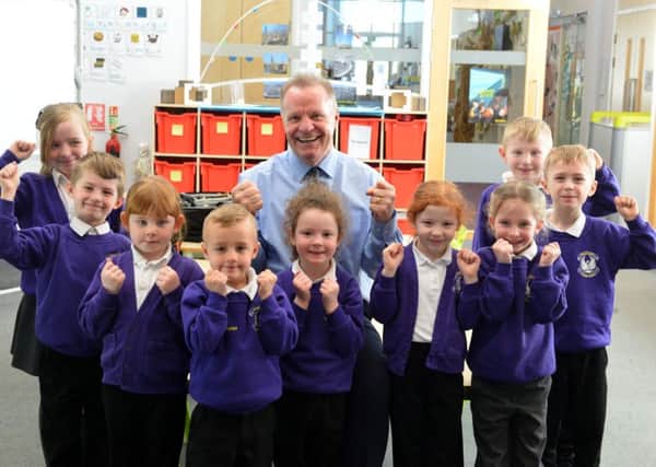 Pupils at Hebburn Lakes Primary celebrate their good Ofsted and, inset, Head Teacher Tony Watson