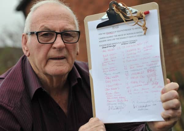 Hebburn resident John Welsh with his Disabled Bay parking petition.