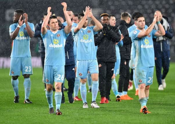 Sunderland's players applaud the fans after last night's stunning 4-1 win at Derby. Picture by Frank Reid
