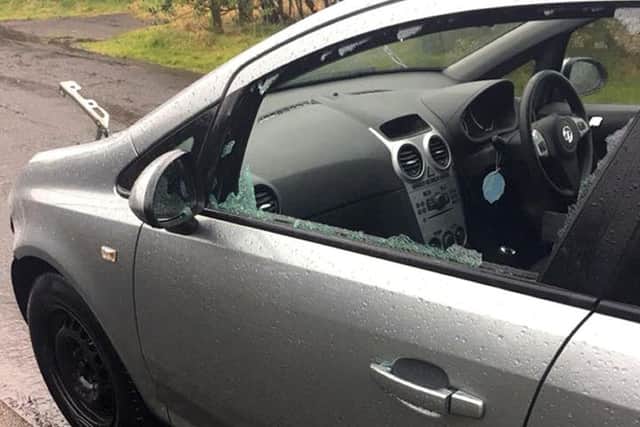 The window was also smashed by the vandals. Photo by the Press Association.