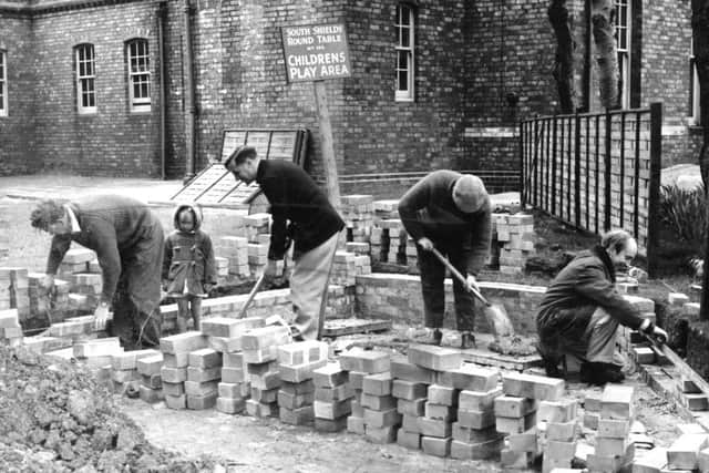 May 1963  Members of the South Shields Round Table at work on the children's playground which they are constructing at South Shields General Hospital.