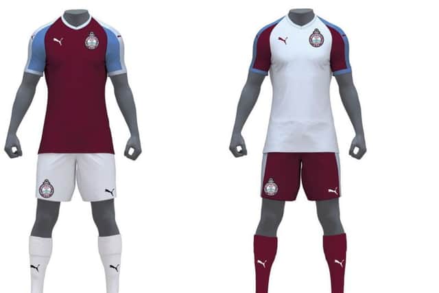 The club's new home and away kits.