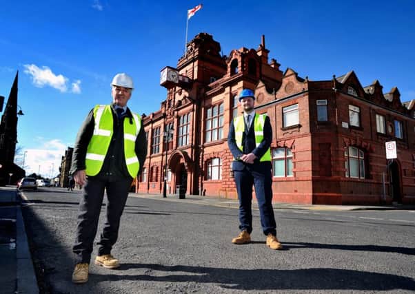 Contracts manager at Hodgson Sayers, left, with building project surveyor at South Tyneside Council, Philip Close, at Jarrow Town Hall.