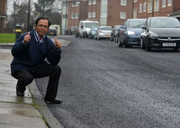 Ali Hayder in Bedford Avenue, South Shields, where the road has been resurfaced after complaints about the potholes.