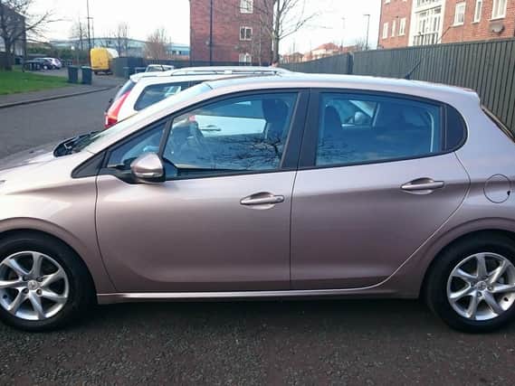 Police are appealing for information after this pink Peugeot 208 was stolen.