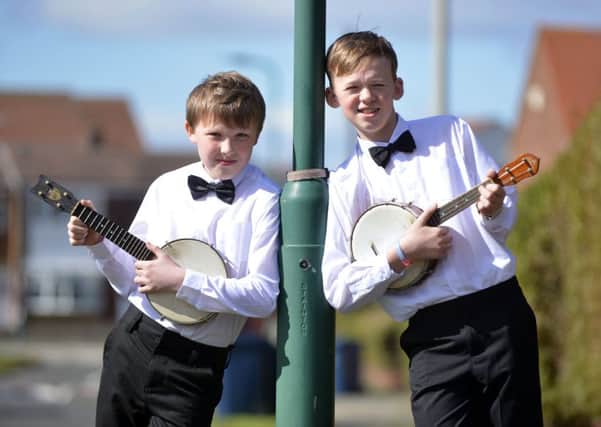 James Bassett and friend Tai Steehouder (L) are to perform for the Queen