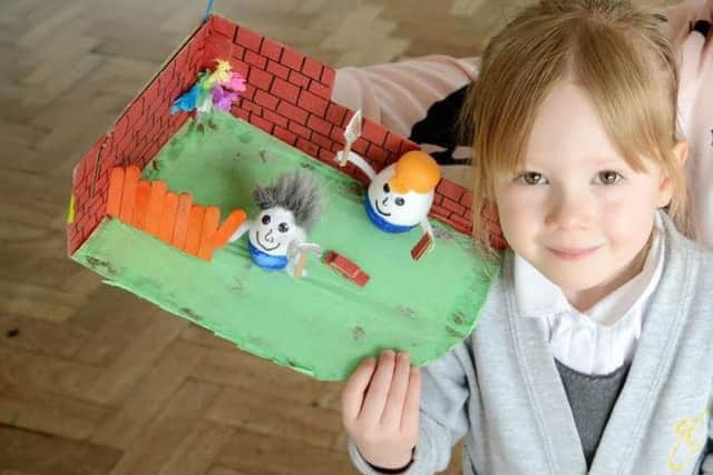 A Toner Avenue Primary School youngsters shows her version of the new Miller Homes housing development.