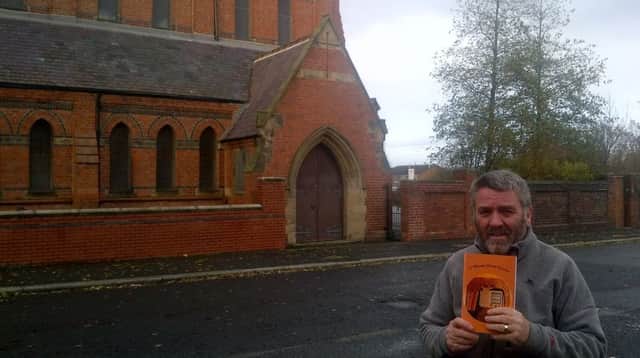 Joe Stewart outside of St Aloysius Hebburn which features in the book.