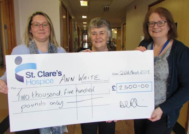 From left, Linda Tuck, fundraising adminstrator at St Clares with raffle winner Ann White, and Wendy McGauley, the hospices head of fundraising and communications.