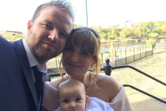 Davina Smith with husband Matthew and their daughter Isabelle.
