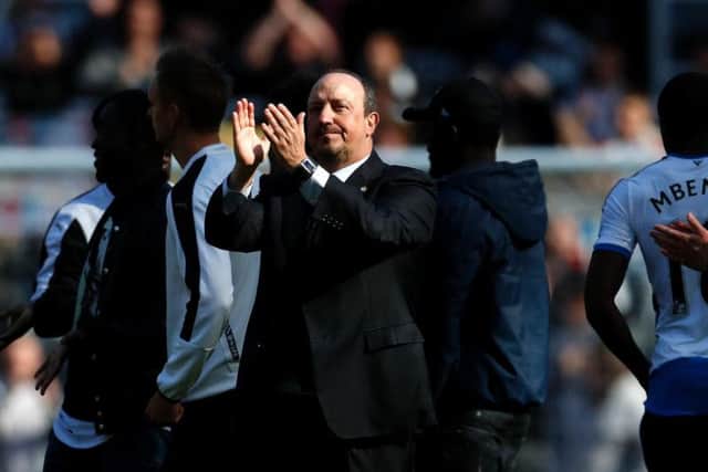 Rafa Benitez applauds Newcastle's fans after the 5-1 win over Tottenham