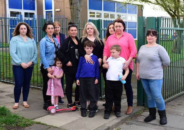 Parents outside Fellagte Autistic Unit, Oxford Way, Jarrow,  who are angry over cuts to staff at the unit.