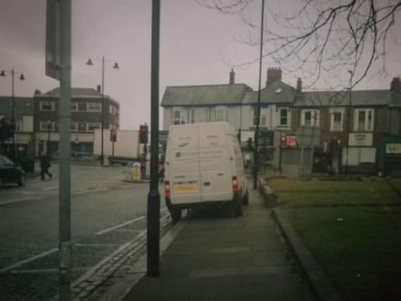 A van parked on the pavement in Sea Road, South Shields.