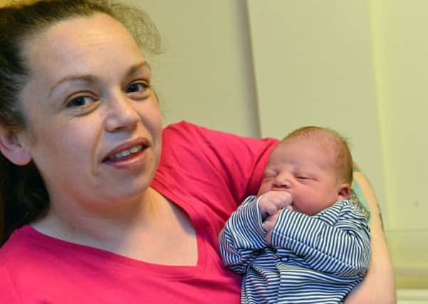 Amy Henley with her baby boy